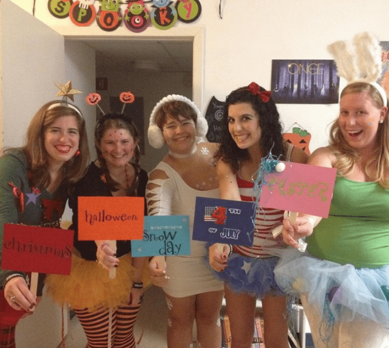 Five women are dressed up as different seasons.