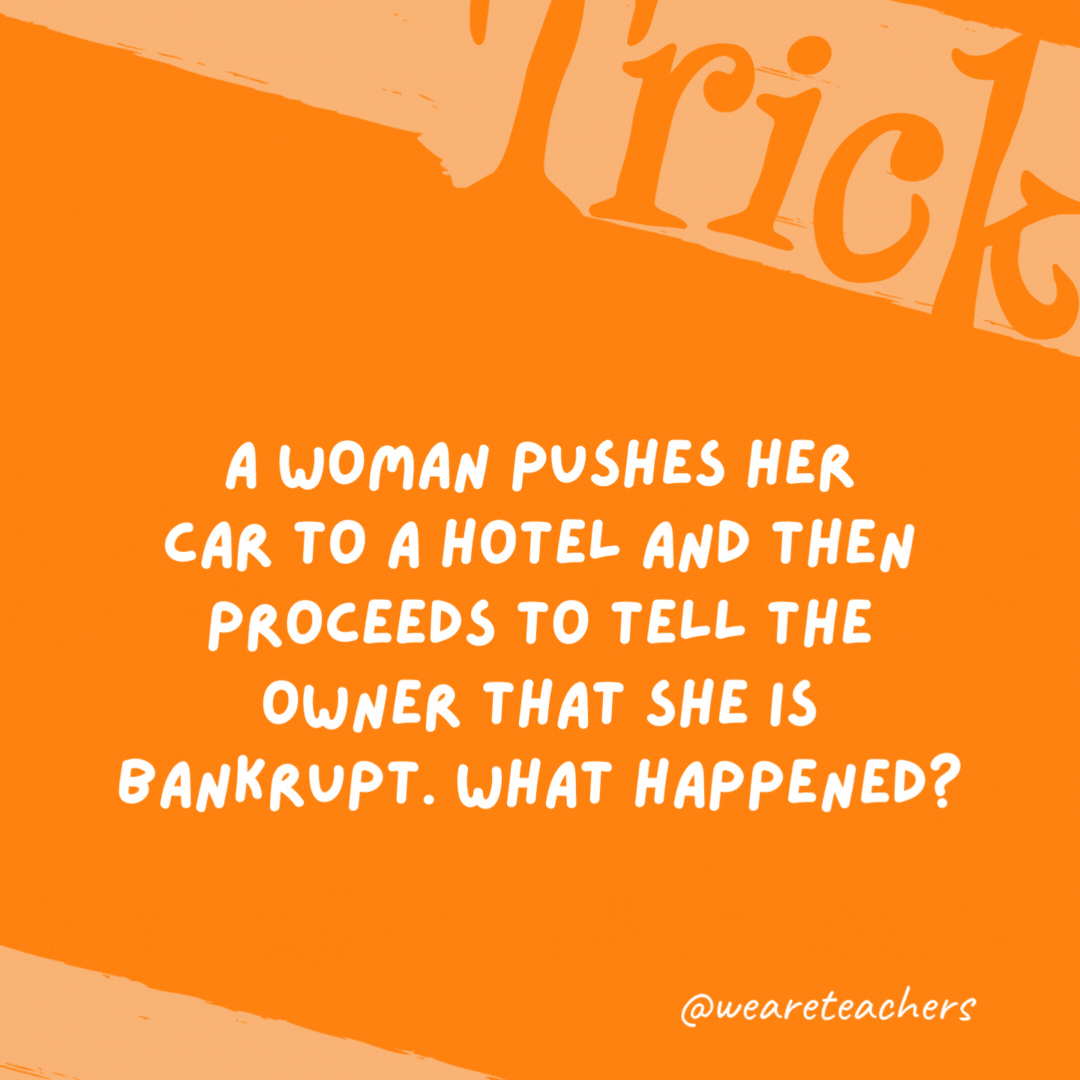 A woman pushes her car to a hotel and then proceeds to tell the owner that she is bankrupt. What happened?

She is playing Monopoly and her playing piece/token is the car.