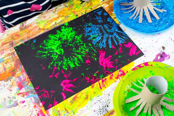 Firework stamps on black paper.- fourth of july activities