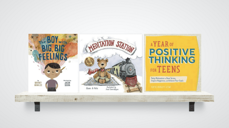 Three books about mindfulness displayed on a shelf