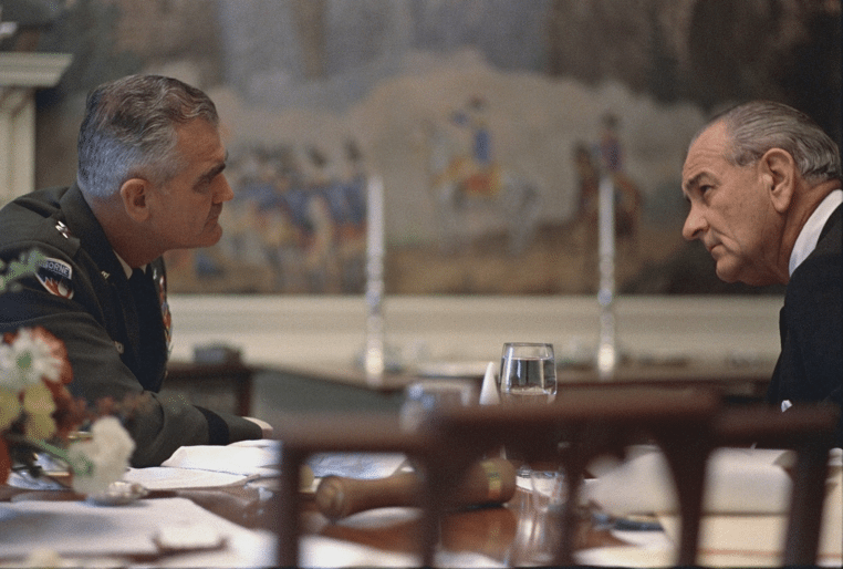 General William Westmoreland and President Lyndon B. Johnson sitting at table