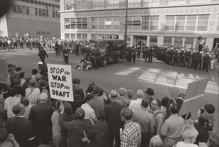 Antiwar protestors gather outside an Army induction center