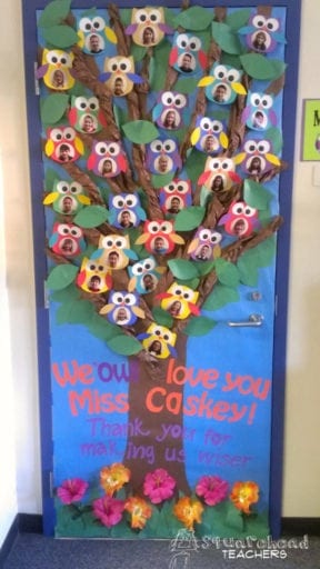 Door decoration with owls and students faces