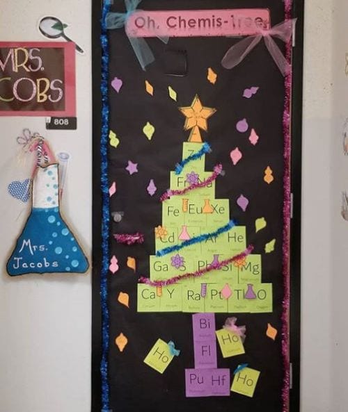 A door says Oh-Chemis-Tree and features a Christmas tree made up of the periodic table of the elements