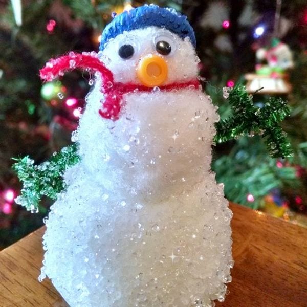 Snowman made of cotton balls covered in crystals (Winter Science Experiments)