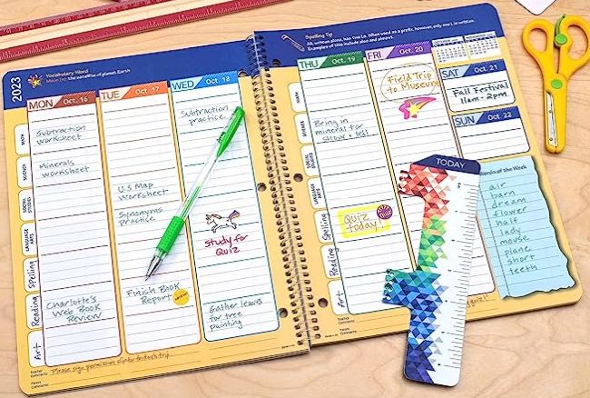 Elementary student planner with room for daily subject planning and an accompanying ruler bookmark