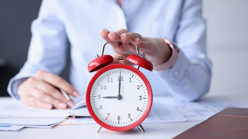 Whether or not to accept late work - red clock timer that teacher is pushing