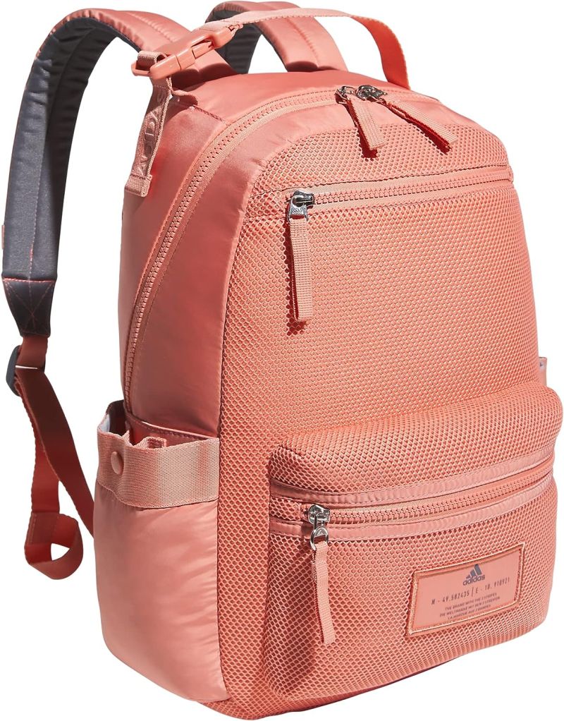 Adidas backpack in coral color with side compartments and front zipper pockets
