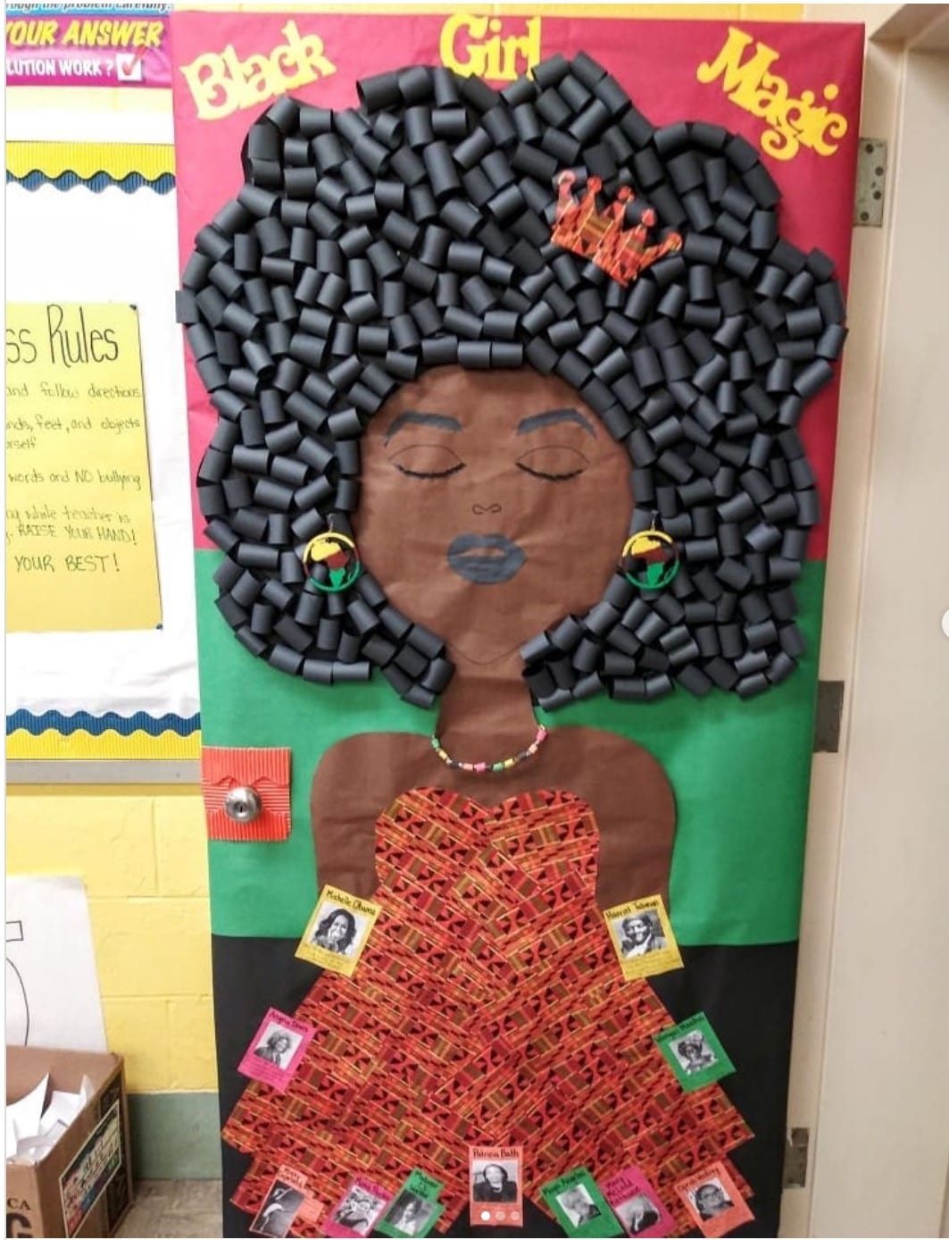 Classroom door titled "Black Girl Magic," showing a Black woman with hair made from black paper curls
