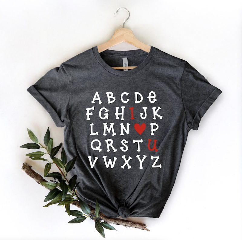 Gray shirt with the alphabet highlighting 'I hear u' in red
