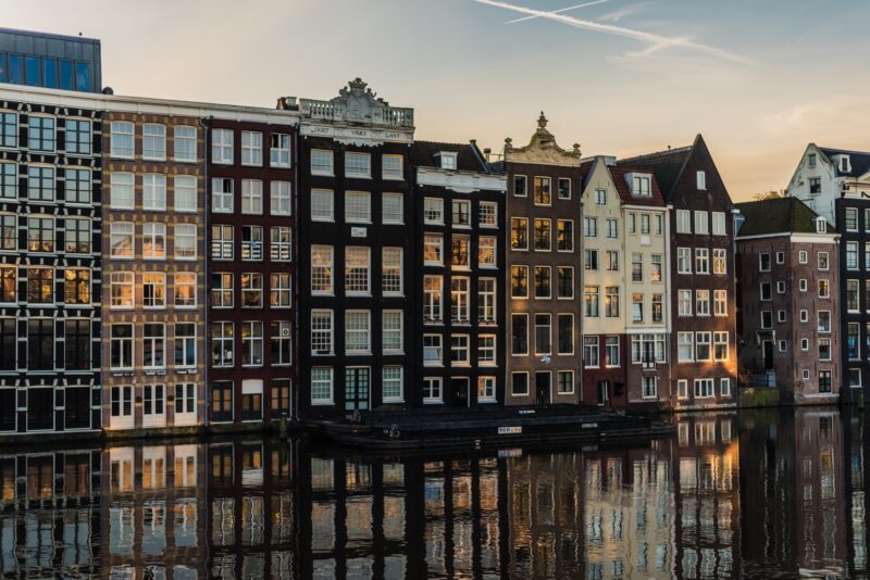 photo-of-houses-and-a-canal-in-amsterdam