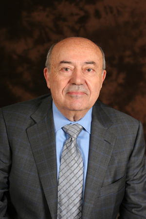 Famous engineers include Andrew Viterbi and include this headshot of him. He is a bald older man looking straight at the camera and not smiling.