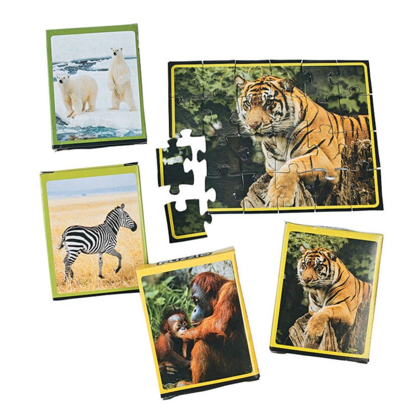 Assorted wildlife puzzles, such as zebra, lion, monkey, tiger, and polar bear, as an example of inexpensive gift ideas for students