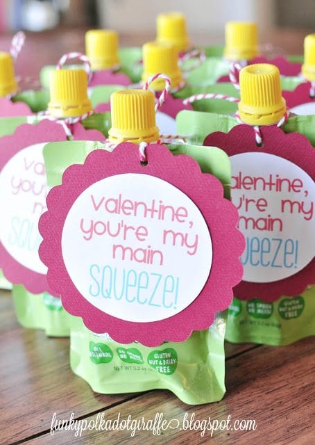 Applesauce packets with a valentine card attached