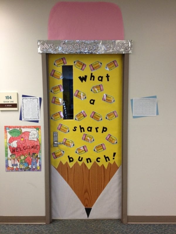 Door decoration of a large pencil and the words "what a sharp bunch!" -- classroom doors
