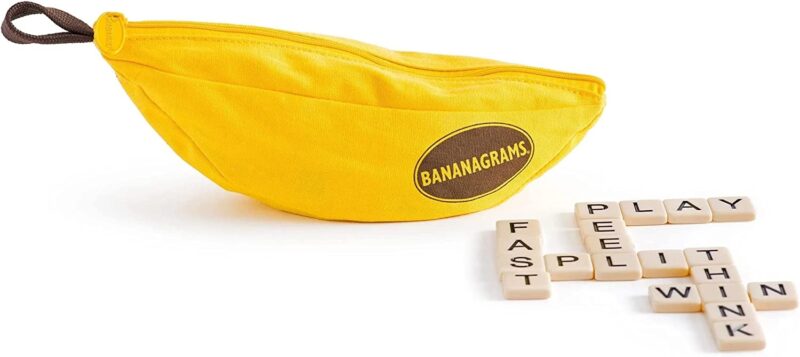 A yellow bag shaped like a banana is shown as are letter tiles that are formed into words (educational board games)