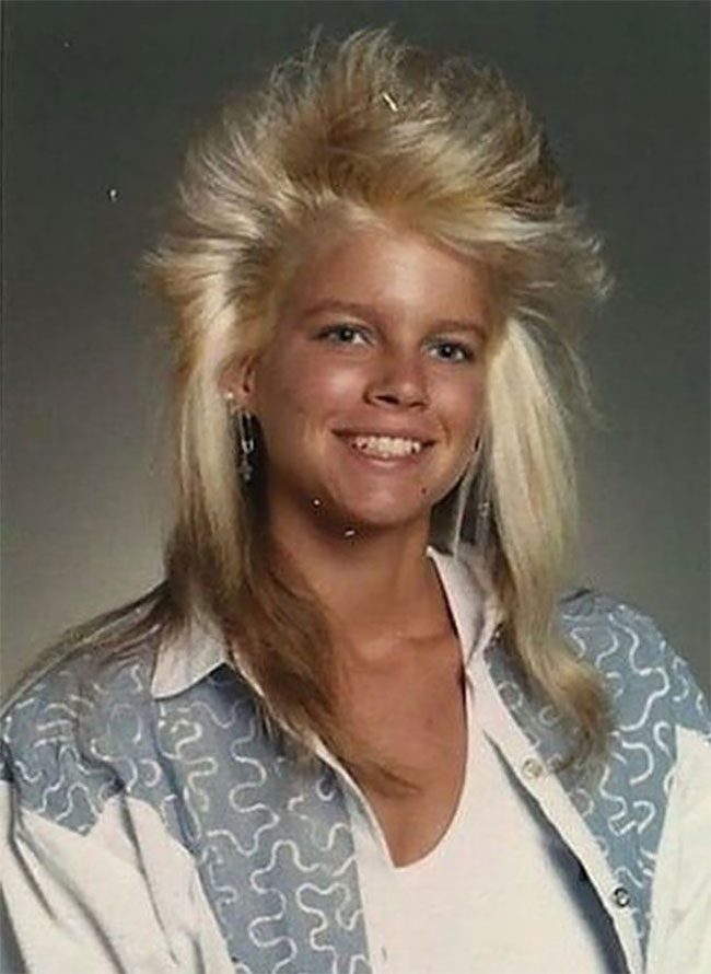Photo of person with mile high Aquanet bangs