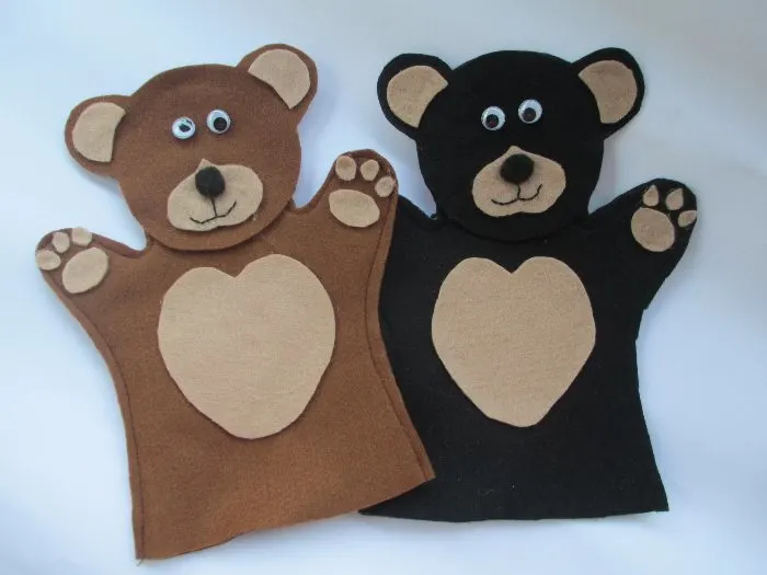 Two teddy bear hand puppets