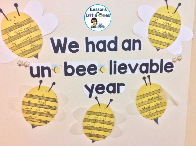 Construction paper bees have writing prompts on them and are attached to a bulletin board. Text reads We had an un bee lievable year.