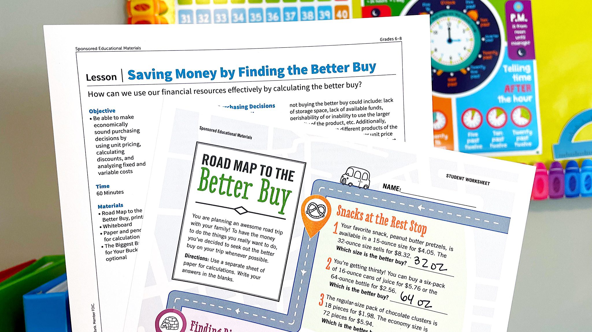 (opens in a new tab) Flat lay of 'Finding the Better Buy' lesson