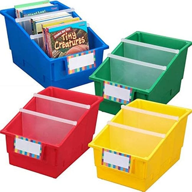 Large divided book bins in red, yellow, blue, and green