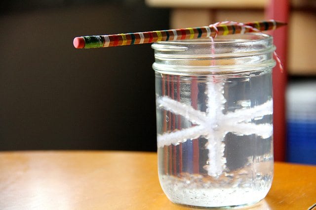 sugar crystal suspended from a pencil over the mouth of a mason jar- weather activities