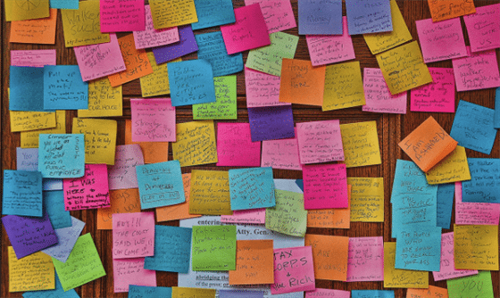 Sticky notes covering a wall