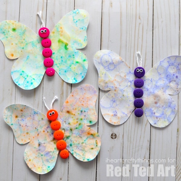 Paper butterflies made from paint bubbles as an example of spring activities for preschoolers