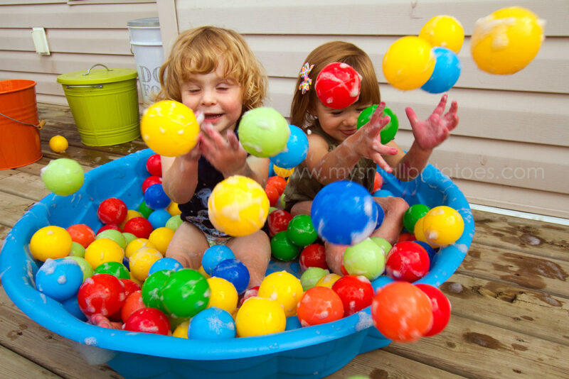 Children playing in bubble pit- summer activities for kids