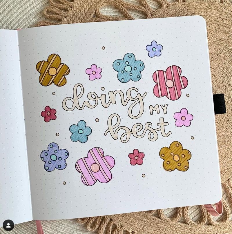 Doodles in a journal, with text reading Doing My Best surrounded by simple colorful flowers