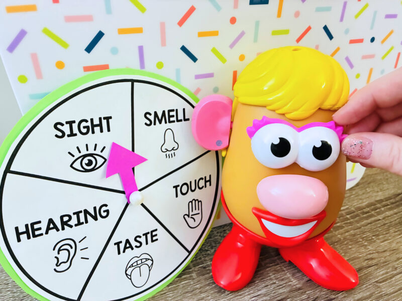 Five Senses Activities a photo of a Mrs. Potato Head game where students spin on a sense (eyes, ears, nose...) to add to Mrs. Potato Head