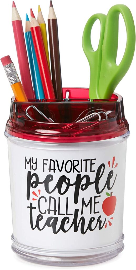 A white cup style desk organizer with school supplies in it says My favorite people call my teacher.