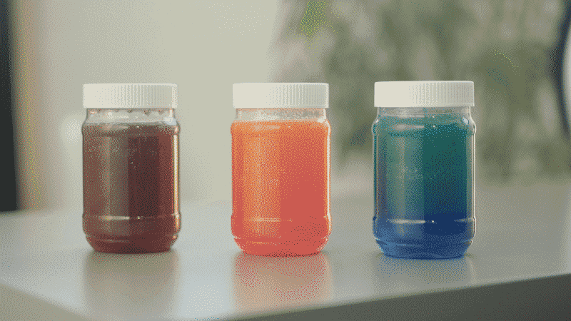 Animated gif of plastic jars filled with color-changing liquids (Inexpensive Gift Ideas for Students)