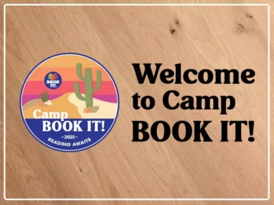 "Welcome to Camp BOOK IT!" on wooden background with BOOK IT Summer Reading logo with includes illustration of desert with cactus