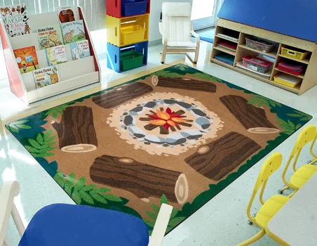 A rug is shown in a classroom setting. It features 6 logs surrounding a campfire.