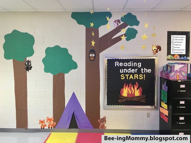 Tree, tent, and campfire wall decor for classroom