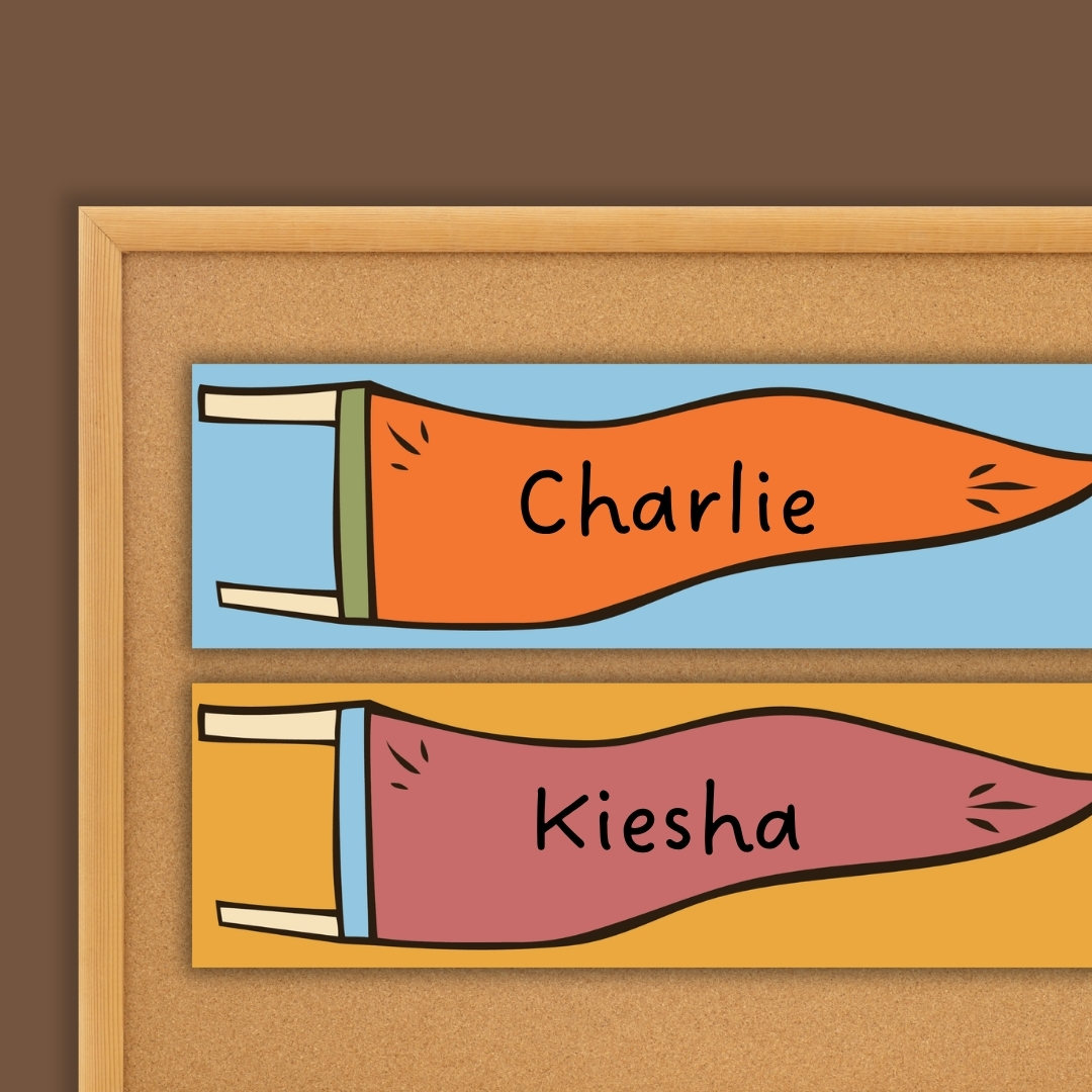 Camping theme classroom decor pennant nameplates with student names on a bulletin board