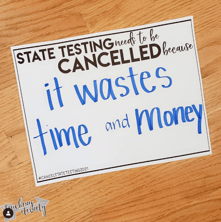 Instagram image of sign stating that state testing wastes time and money