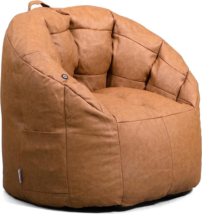 A large structured brown chair has a handle on the top.