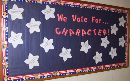Bulletin board with "We vote for CHARACTER" written on it