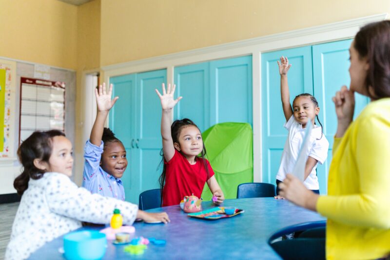 Children sitting at a school table