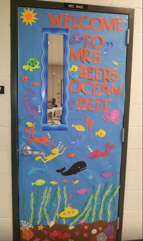 Classroom door decorated with an ocean theme