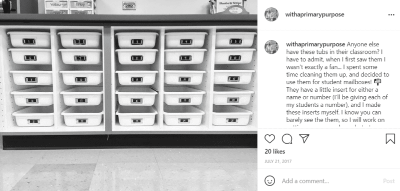 Black and white image of shelving with pull-out bins from IKEA being used as classroom student mailboxes