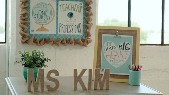 Burlap classroom decorations, including a bulletin board, sign, and 3-D letters