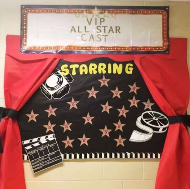 Hollywood-themed bulletin board reading VIP All-Star Cast with children's names in stars