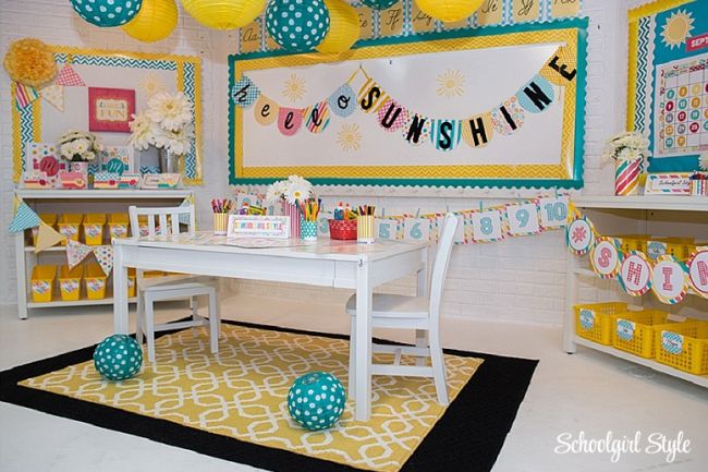 A classroom full of sunshine decorations in bright colors, including a "Welcome Sunshine" wall banner
