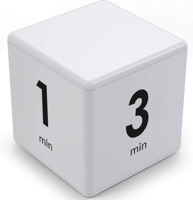 White cube timer with 1 min and 3 min sides showing