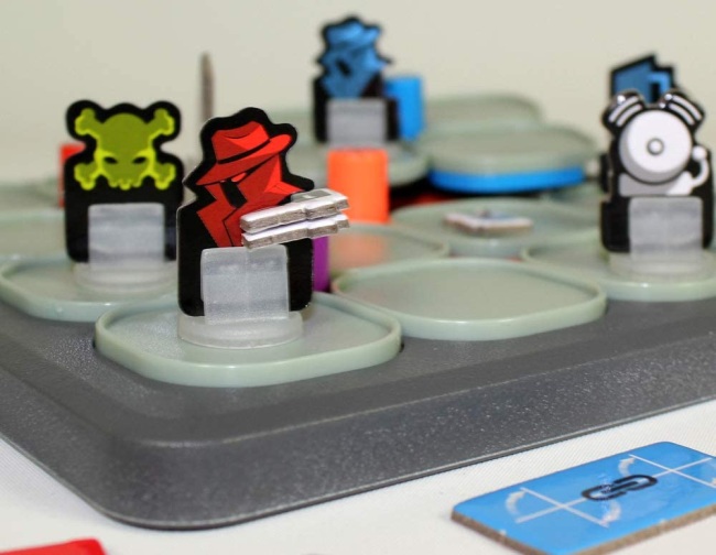 Close-up of playing pieces for the coding board game Hacker