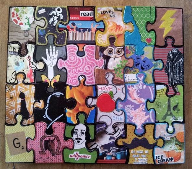 Jigsaw puzzle painted with different images and patterns on each piece 