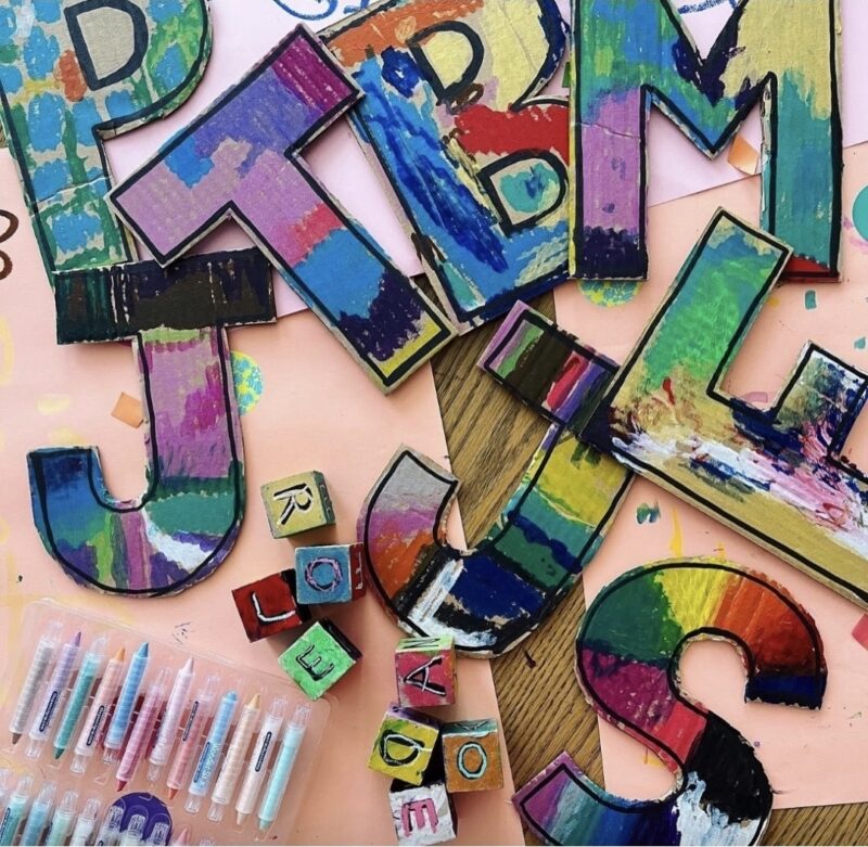 Collaborative alphabet letters made from cardboard and paint